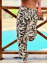 Pantalón Bombacho Beige Hojas Negras